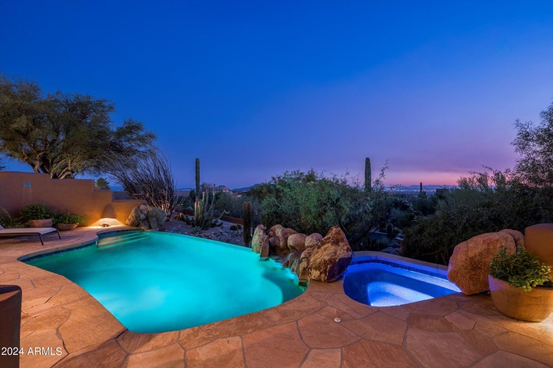 Evening Pool and City Lights