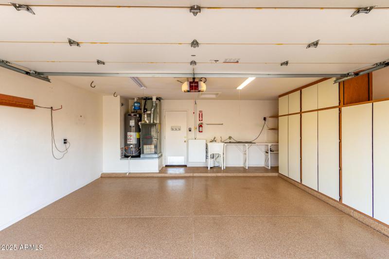 2-car garage w/ built in cabinets
