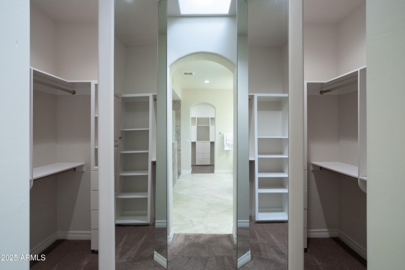 Primary Suite Walk In Closet 1