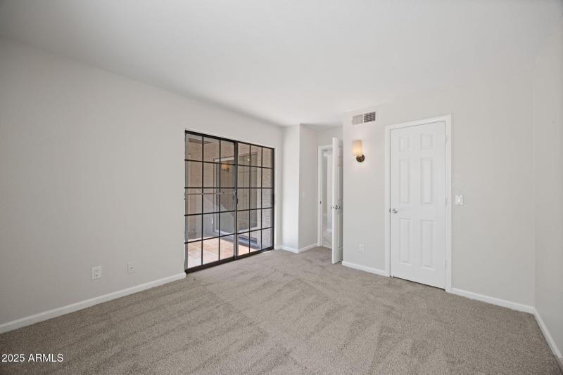 Bedroom View to Patio and Closet