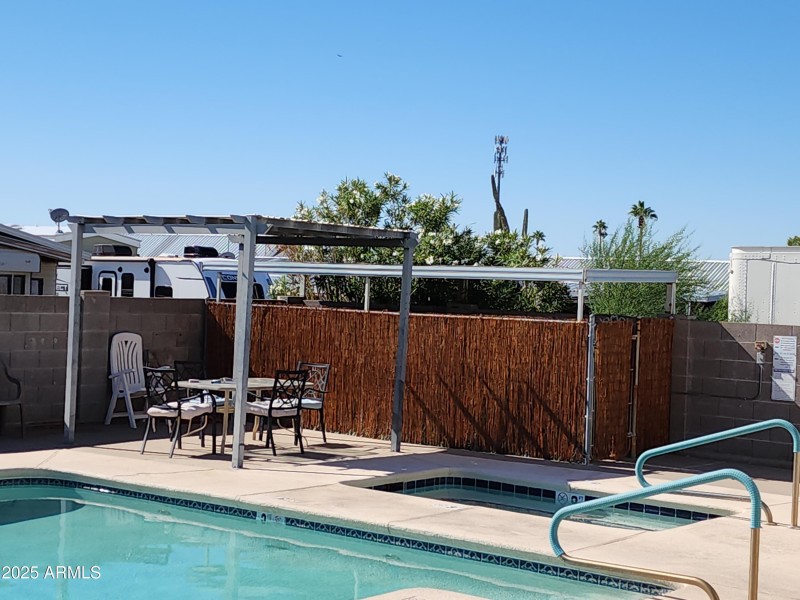 9. Covered seating and a Hot Tub