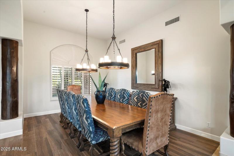 Formal Dining with Custom Lighting