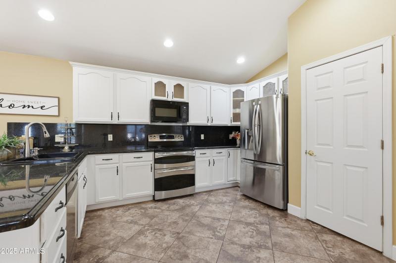 white cabinetry with hardware