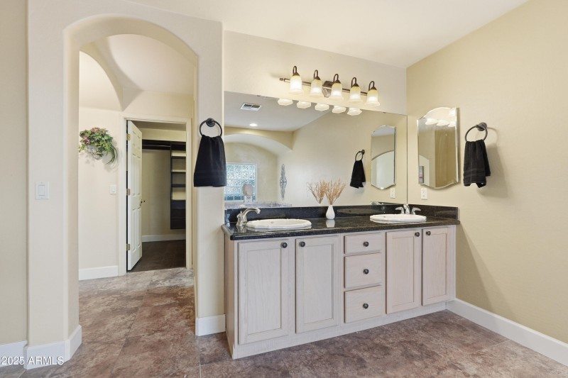 Double sinks, raised vanity