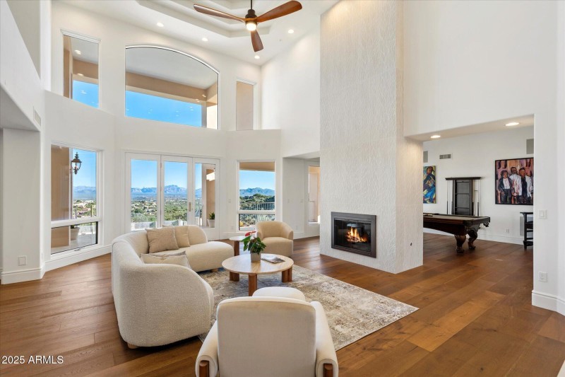 Sunlit Living Area with Wall of Windows