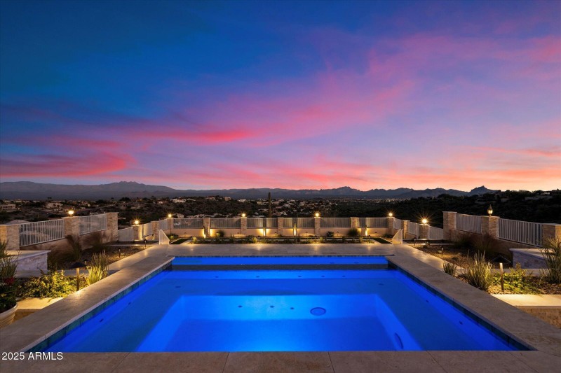 Illuminated Pool Overlooking Acreage