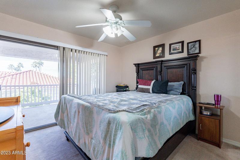 Second upstairs bedroom with patio