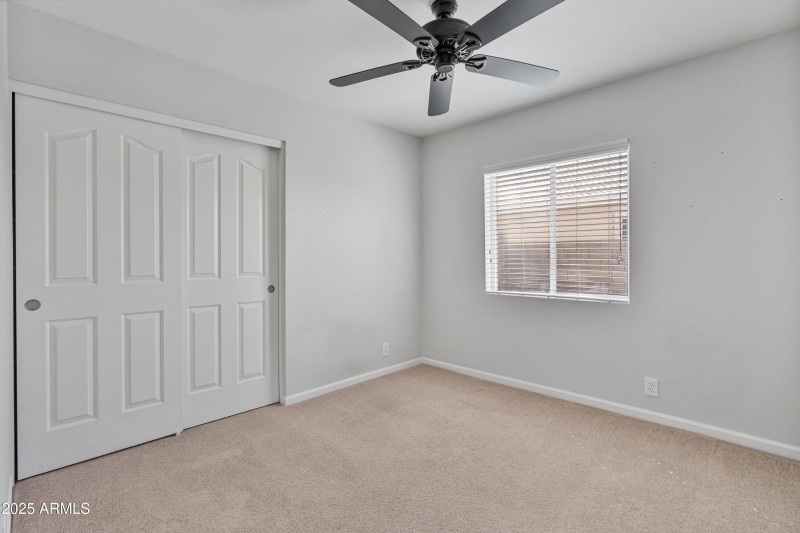 Guest Bedroom with Ceiling Fan