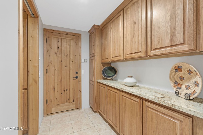 Hallway to Garage with Storage