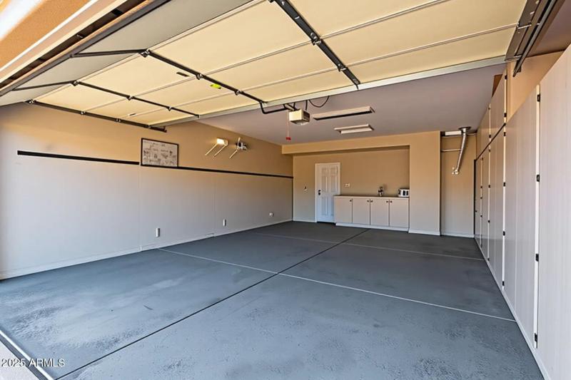Extended Garage w/Buit-in Cabinets