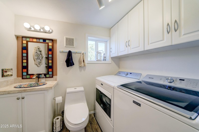 half bath plus laundry off AZ Room