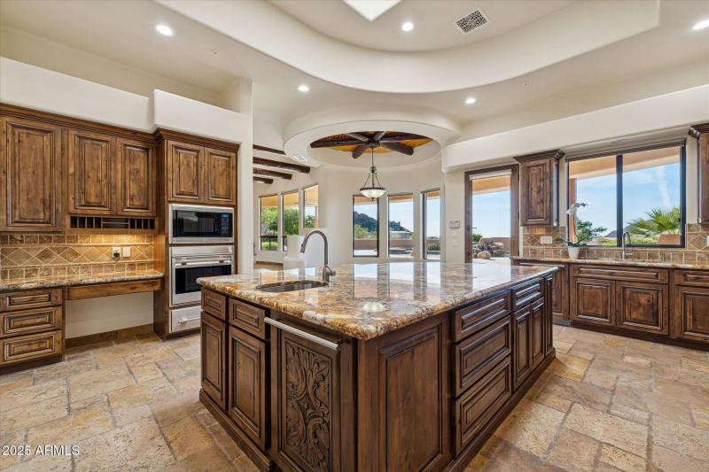 Kitchen Looks out at Patio Area