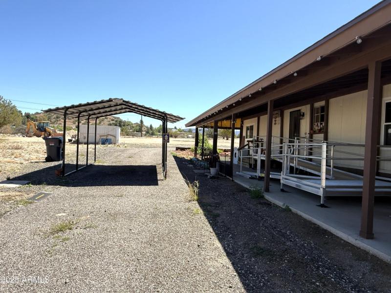 26 new car cover and back of house