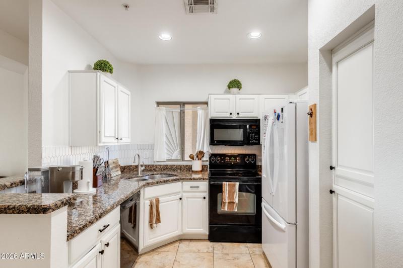 Kitchen with full compliment of applianc