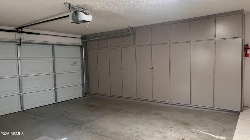 2-car garage with shelving