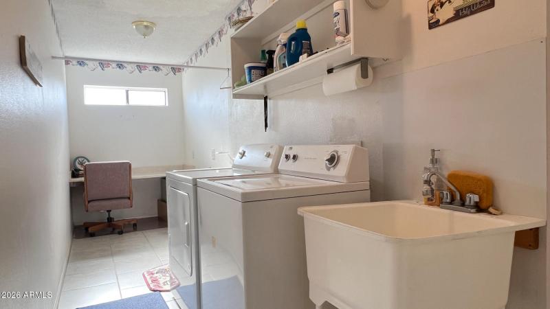 Laundry w/desk at one end.