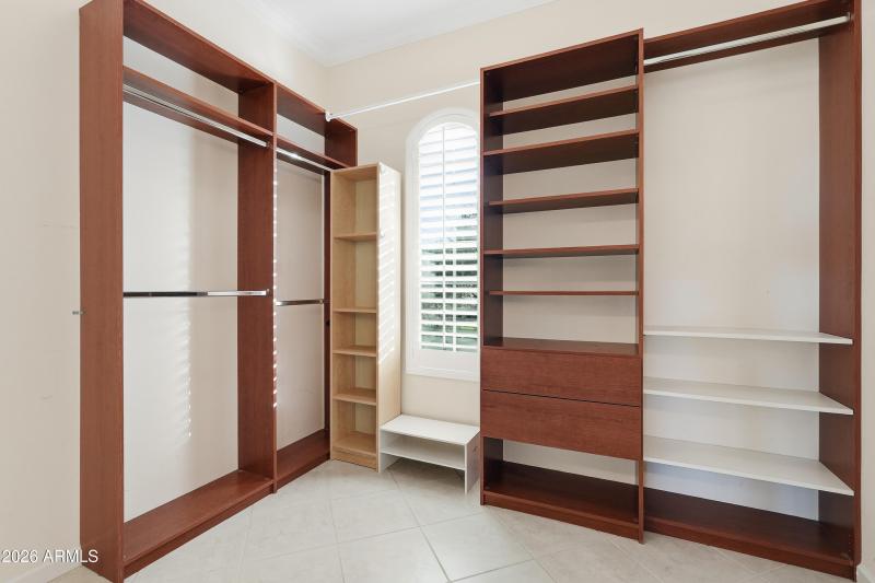 First closet in primary bedroom