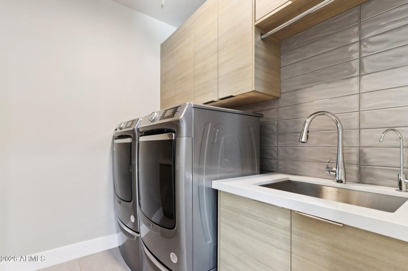 Inside Laundry with utility sink