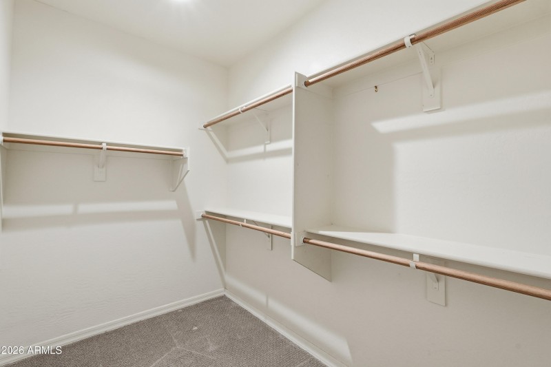 Two master bedroom walk-in closets