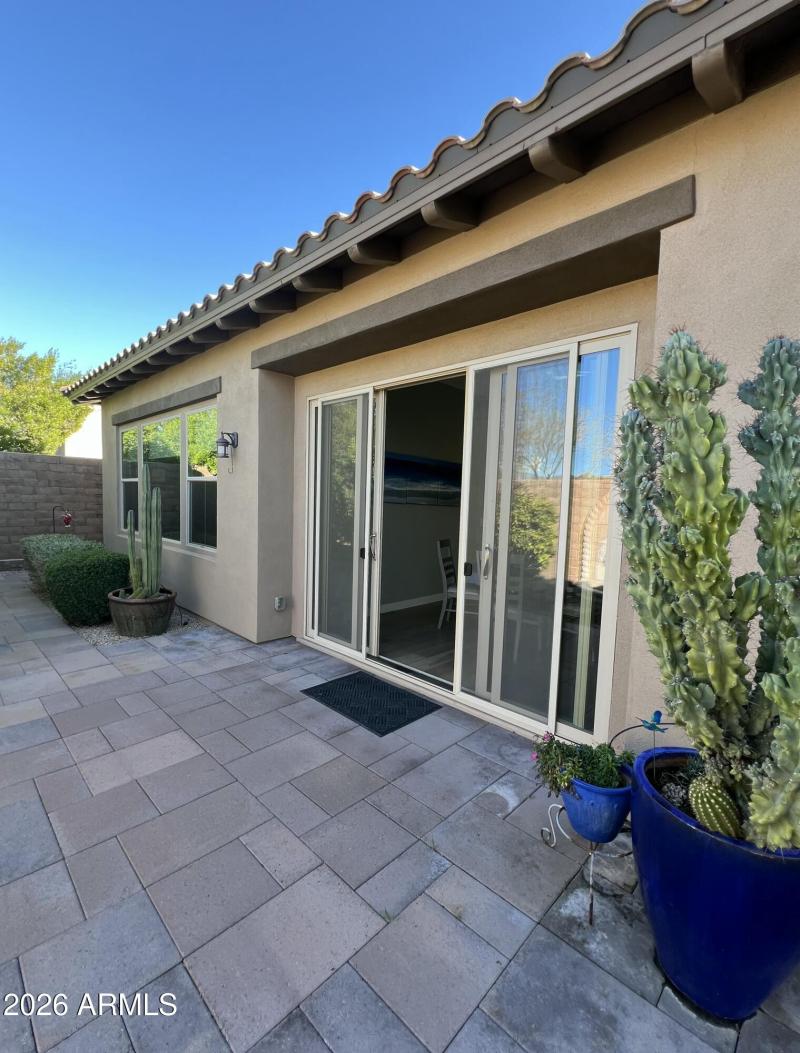 Private back patio w/fountain and garden