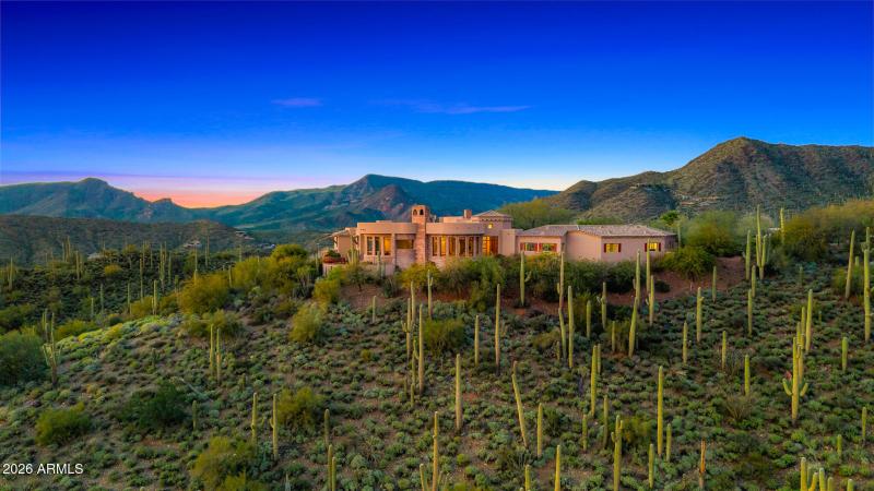 84front of property_aerial twilight4