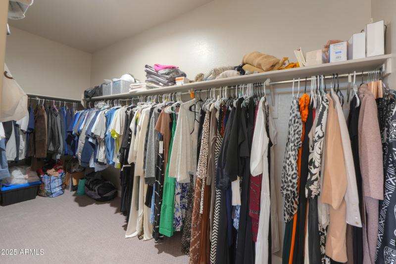 Huge walk-in closet in primary