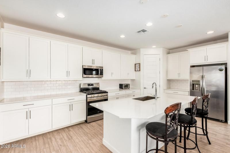 Beautiful Kitchen with tiled back splash