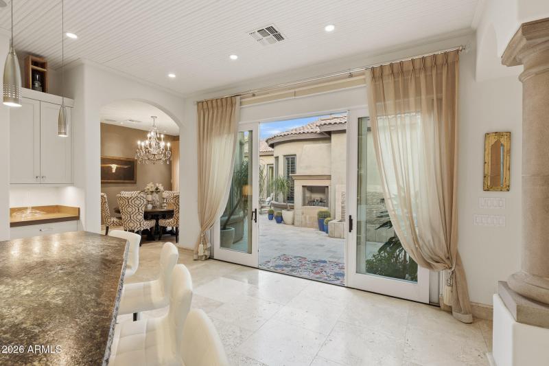 Doors open to Front Courtyard