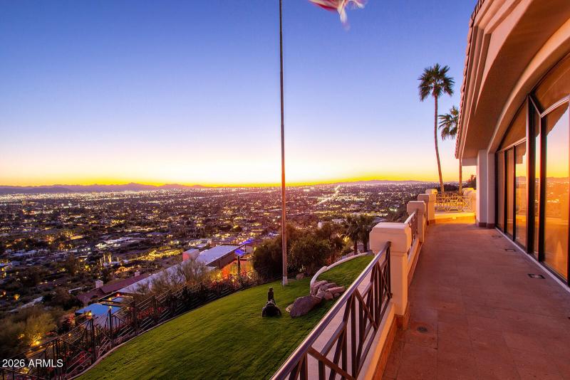 DUSK BRINGS TWINKLING CITY LIGHTS