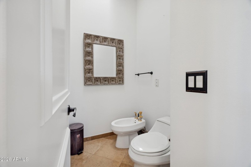 Toilet room with bidet