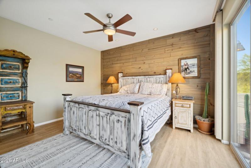 Casita bedroom with wood slatted wall