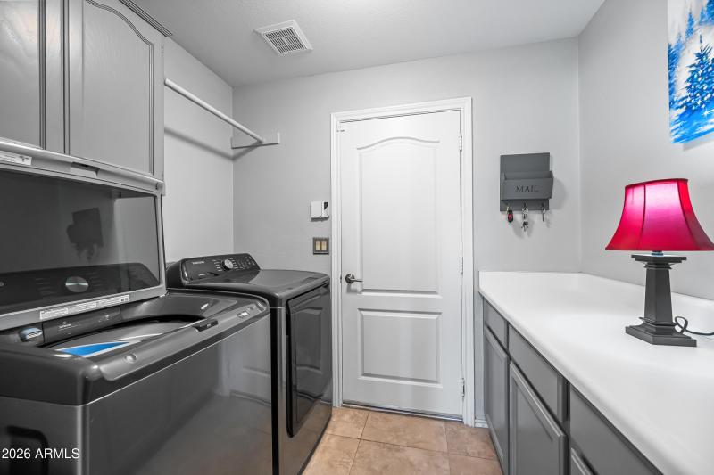 laundry on first floor with garage entry