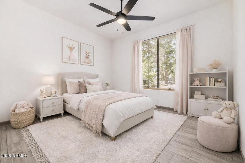 Pastel-themed child's bedroom with toys