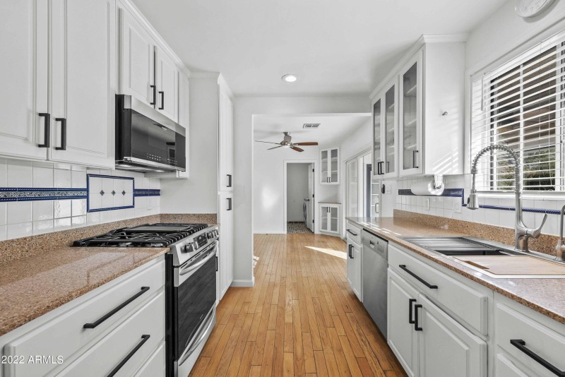Kitchen View to Laundry and Yard