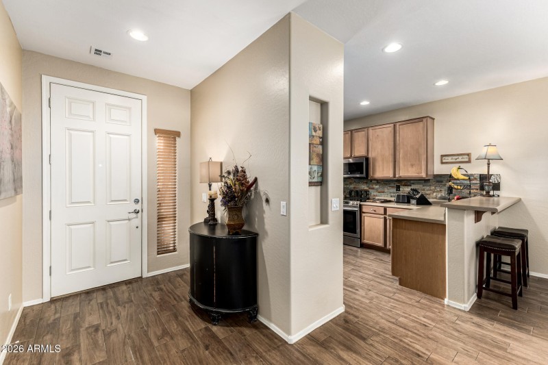 View of entry and kitchen entry