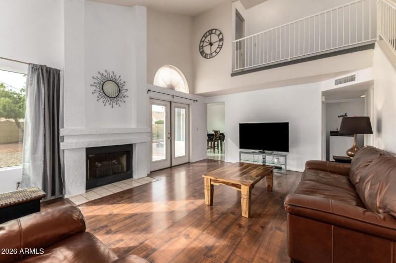 Living Room w/tons of light & Fireplace!