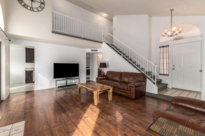 Living Room w/tons of light & Fireplace!