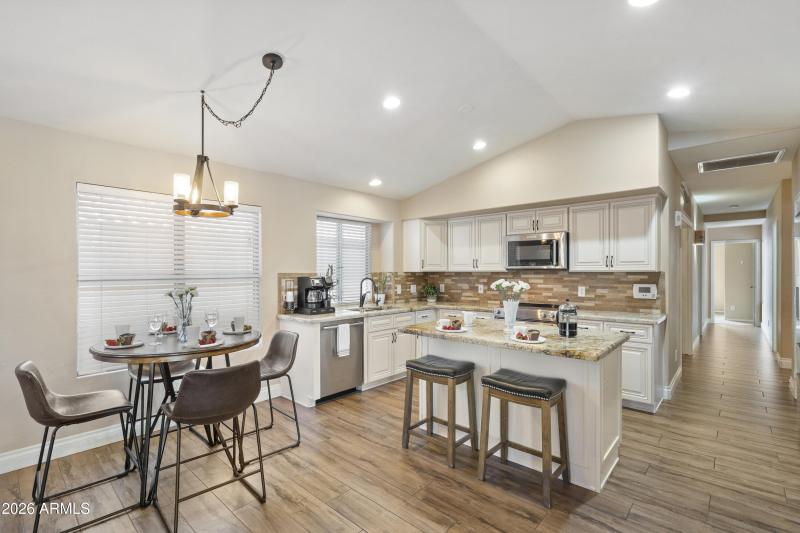 UPDATED KITCHEN WITH CONVENIENT ISLAND