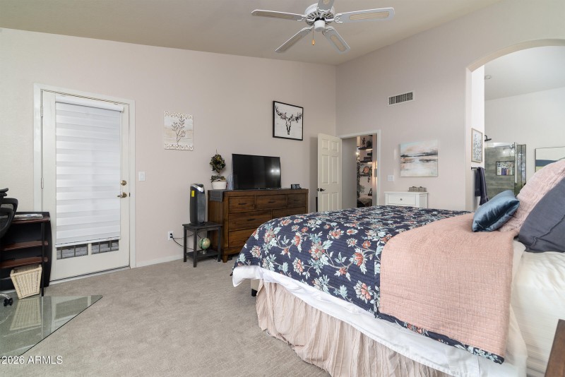 Master bedroom with door to back
