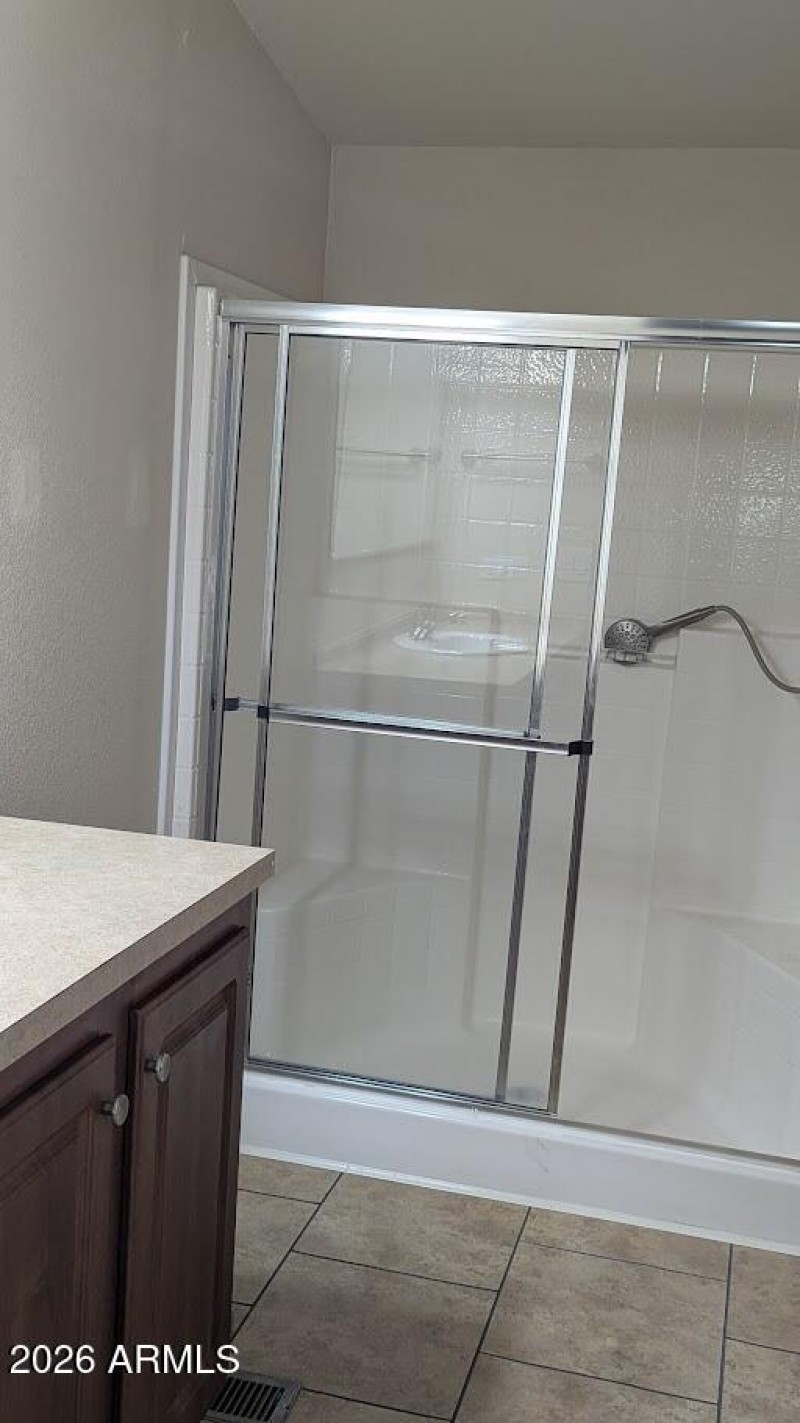 Shower in primary bedroom