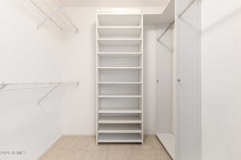 Primary Bedroom Walk in closet