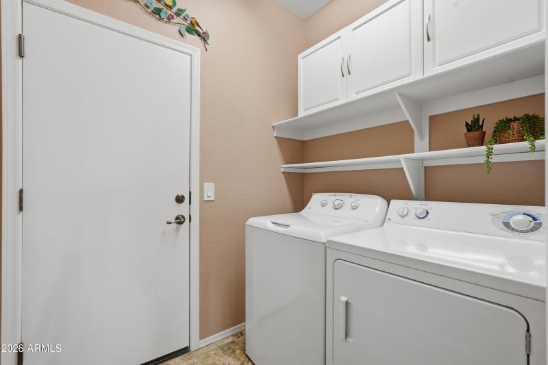 Laundry with Cabinets & Shelving