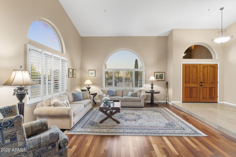 Formal living room w/soaring ceilings