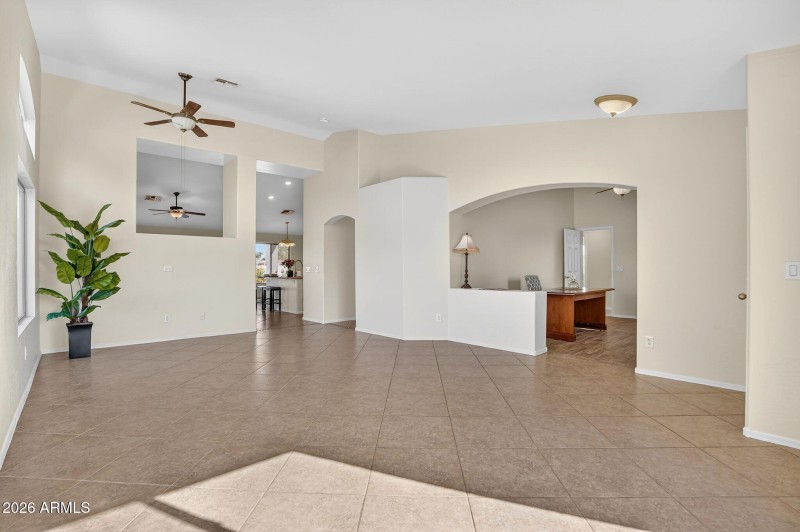 Living room and open office or den