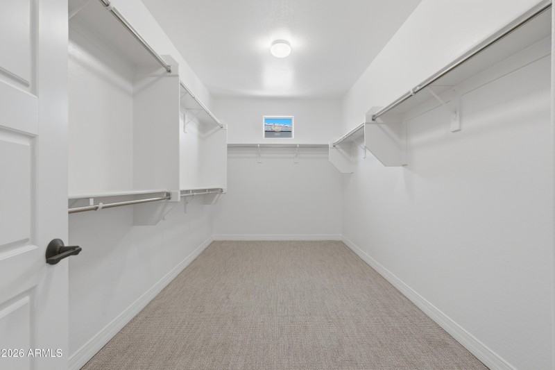 Upstairs primary walk in closet