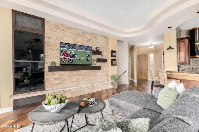 Modern living room with football game