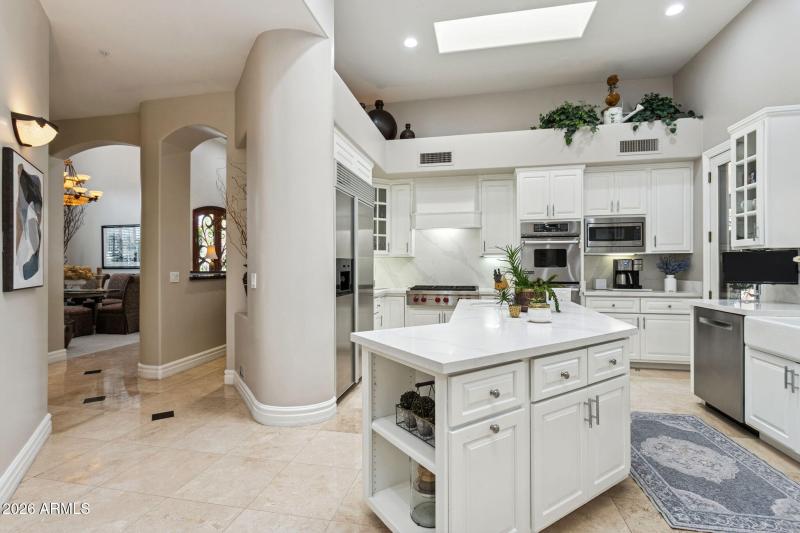 Kitchen Island + Ample Cabinetry