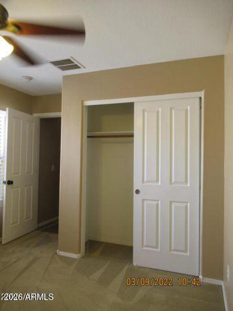 downstairs bedroom with closet