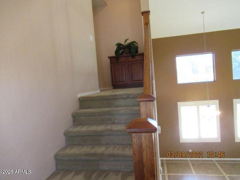 to the right of the stairs are the bedro