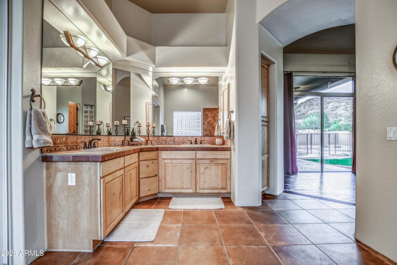 Primary bathroom showing backyard
